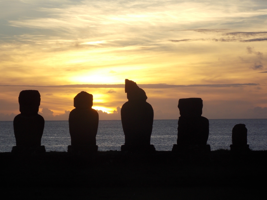 Recognize the fourth guy from the left? We didn't know that when he was phoning home, home was really Easter Island. Cheers!